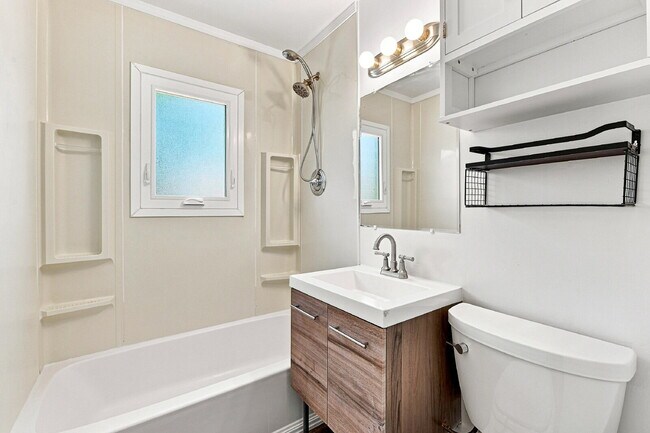 Building Photo - $1,545.95, 2-bed, 1-bath home in Brighton with a large fenced backyard.
