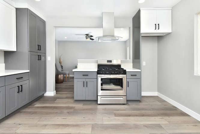 Kitchen opening to living - 4621 W 170th St