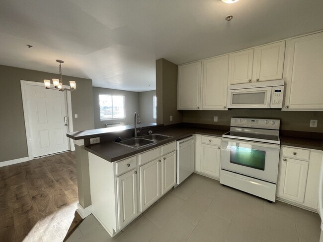 Building Photo - Spotless RANCH 2 Bed, 2 Bath Condo With 1 ...