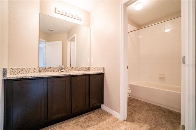 Building Photo - MOVE IN SPECIAL- 3/2.5 Beautiful Energy Efficient Townhome in St. Cloud