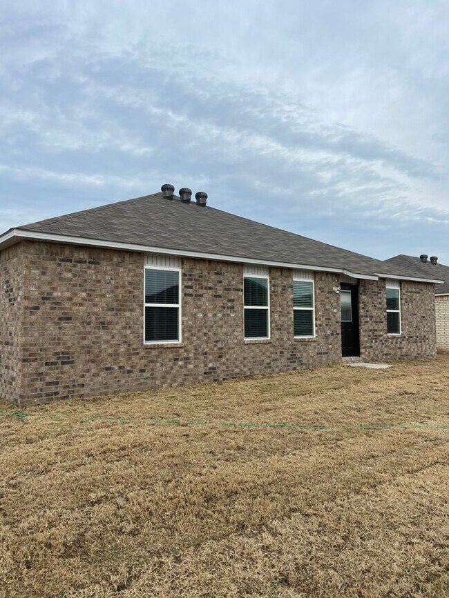 Building Photo - NOW AVAILABLE — Spacious Living in This 4-Bedroom | 2-Bath Conrad Court Home