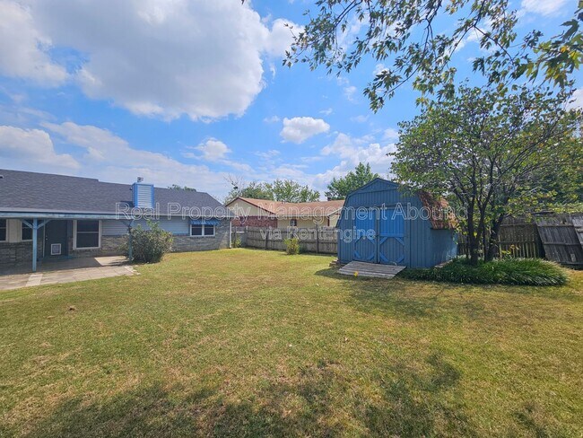 Building Photo - 7710 N 120th Ave E