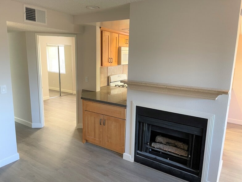 Kitchen pass through + Fireplace - 19808 Sandpiper Plz