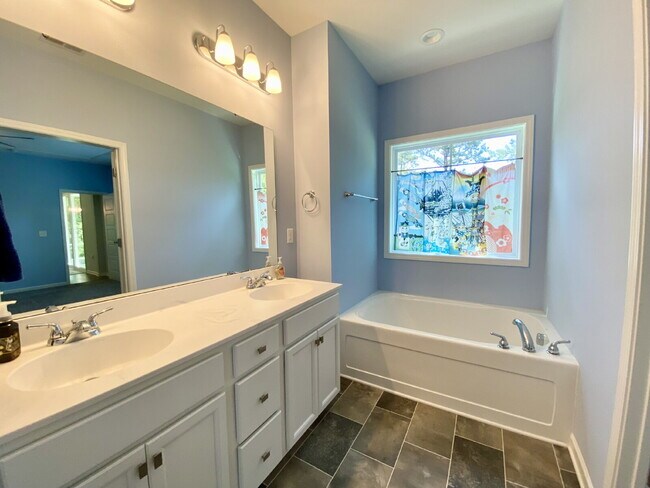 Building Photo - Welcome to Lake Life! Four Bedroom, Single...