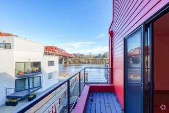 Building Photo - Top-Floor 2-Bedroom Condo with River Views