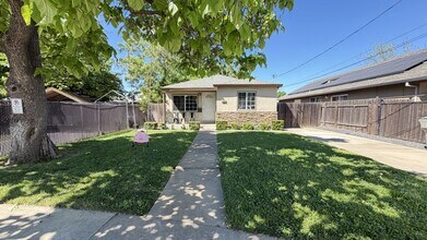 Building Photo - ALF OFF One Month’s Rent! Updated 3BR Home with Garage & Yard – Prime Sacramento Location