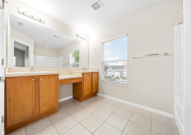 Building Photo - Corner Unit ~ Lake View ~ Maintenance Free...