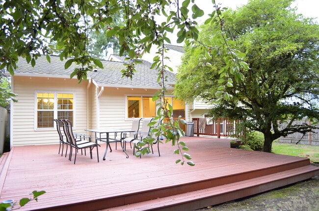 Building Photo - Private Summer Ridge Retreat with Vaulted Ceilings & Fenced Backyard