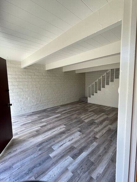Downstairs Living Room looking upstairs. - 451 Dela Vina Ave
