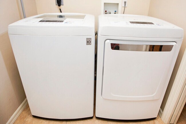 Building Photo - ANNUAL RENTAL - Beach Cottage with 2 Car Garage 'The Lakehouse' in tropical garden