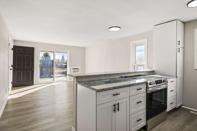 Building Photo - 2-Bedroom Gem with Granite Countertops Available in May