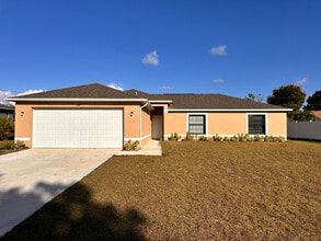 Building Photo - 129 NE 6th Ave