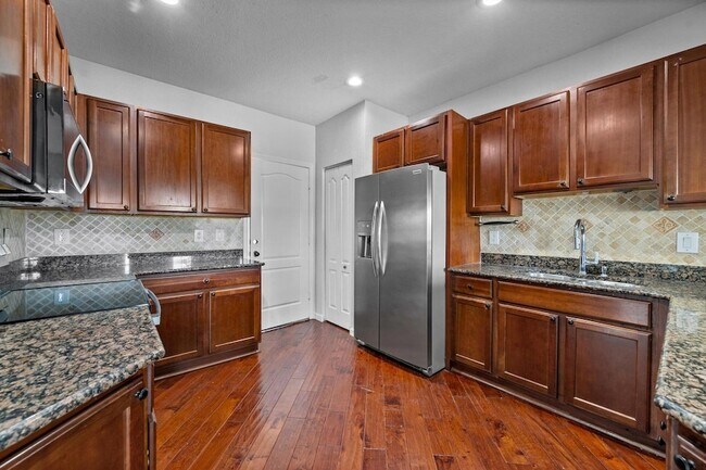 Building Photo - 4205 Bamboo Palm Ct