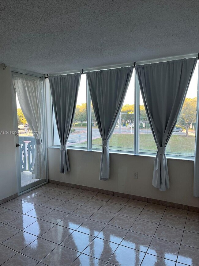 Building Photo - 8233 Harding Ave