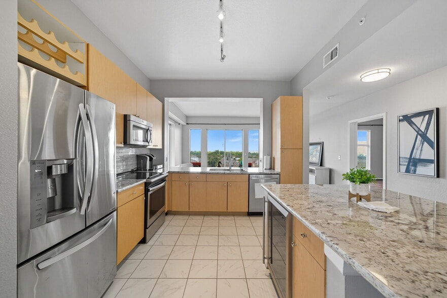 Open kitchen with stainless appliances - 3505 Sage Rd