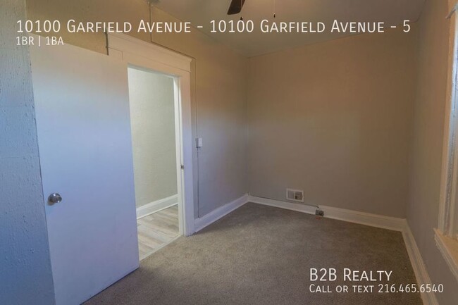 Building Photo - "Charming 1-Bedroom Oasis: Your Perfect Bl...