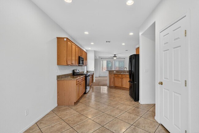 Building Photo - CORNER LOT 4-BEDROOM HOME + LOFT  WITH 3.5 BATHS AND 3-CAR GARAGE!