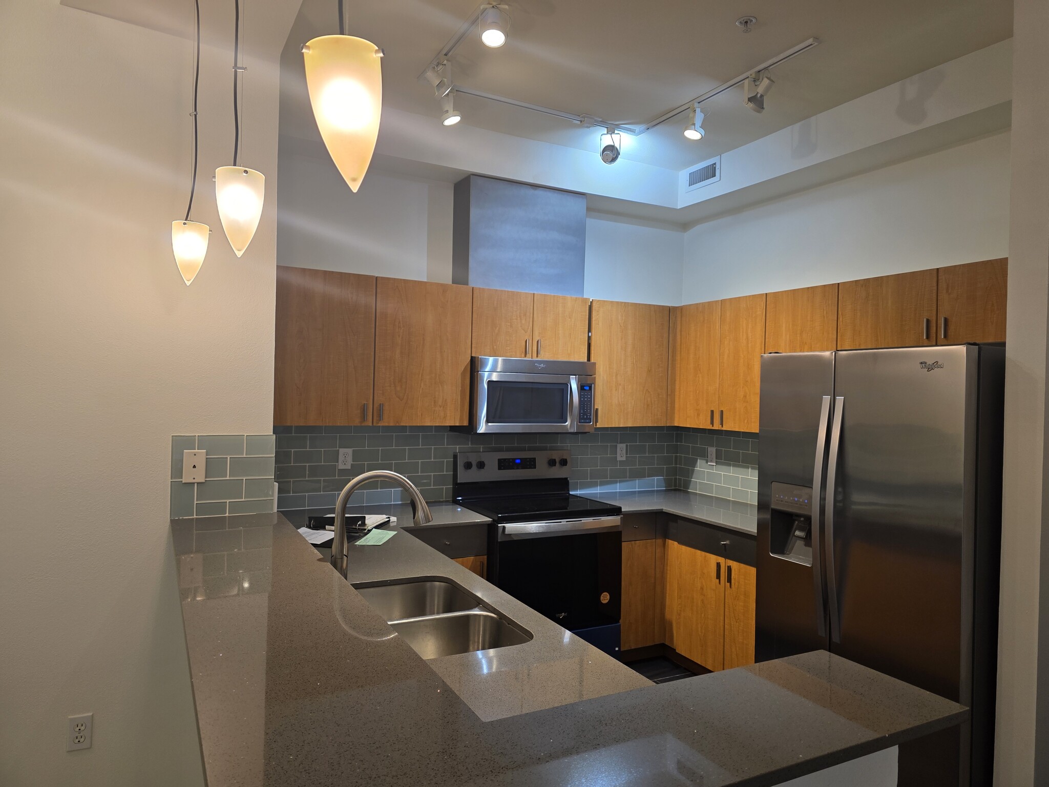 Kitchen with new stainless steel appliances - 521 7th Ave