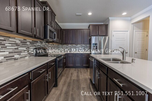 Building Photo - 6867B Spaniel Dr.-