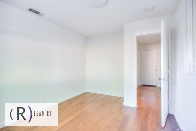 Building Photo - A Captivating and Charming 2 Story Home Ne...