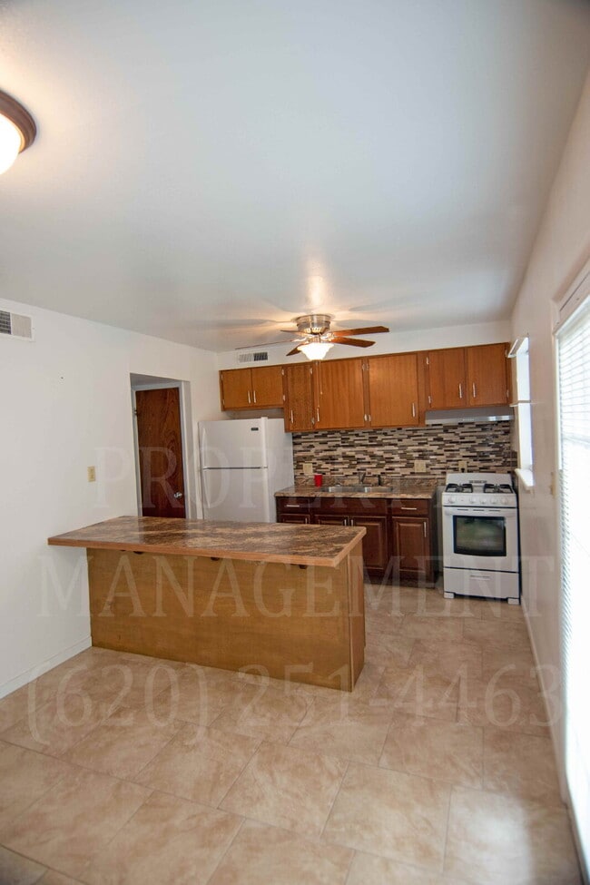 Building Photo - Spacious 2-Bedroom Apartment with Off-Street Parking & On-Site Laundry