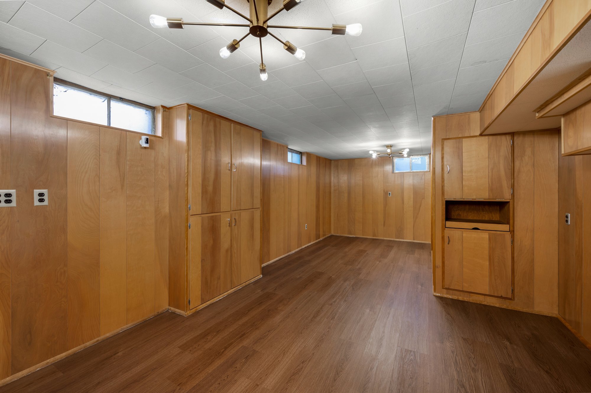 Another view of the large bonus room downstairs. - 114 N Foote Ave