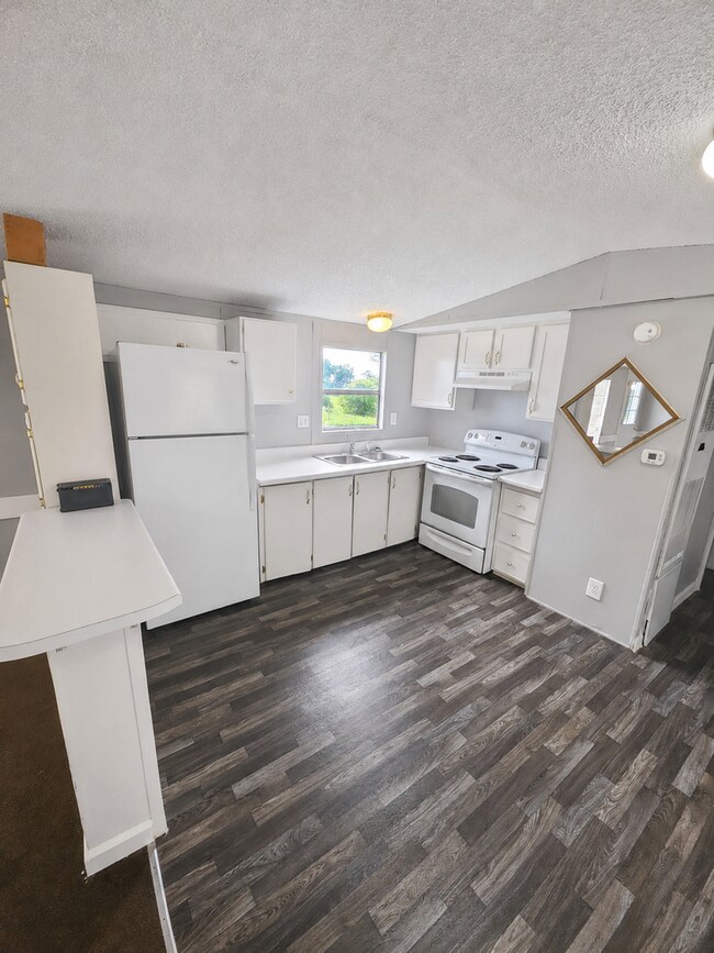 Building Photo - 2-Bedroom Home with New Wooden Deck in a Peaceful Sparta Setting