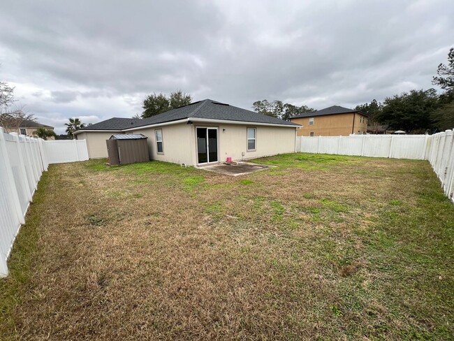 Building Photo - Charming 4-Bedroom Home with Private Yard,...