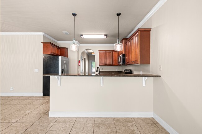 Building Photo - 4 Bed Navarre Townhome in Pool Community
