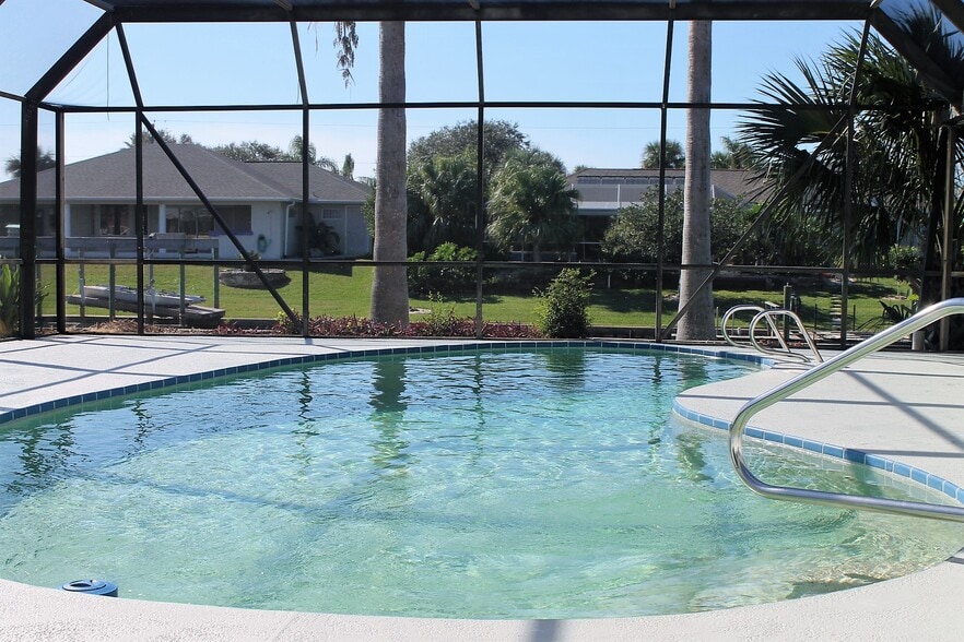 BACKYARD SCREENED POOL - 12 Clarendon Ct S