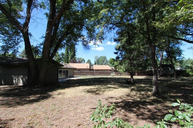 Building Photo - MOVE IN READY! Spacious 4-Bedroom Coconino...