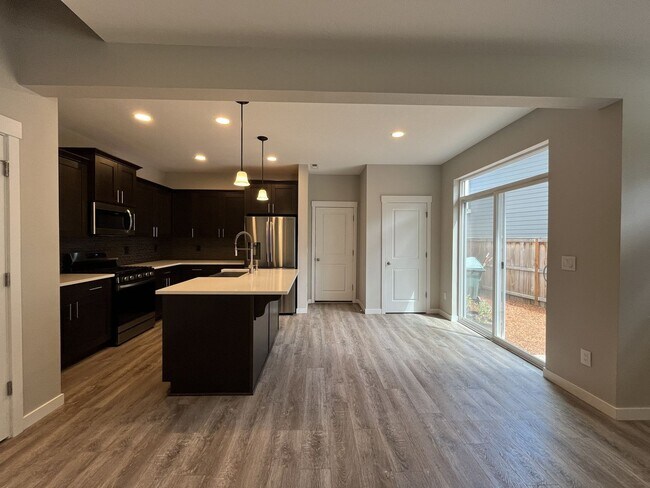 Building Photo - Spacious Modern Home with Open-Concept Living, Elegant Interior Features & Attached Garage