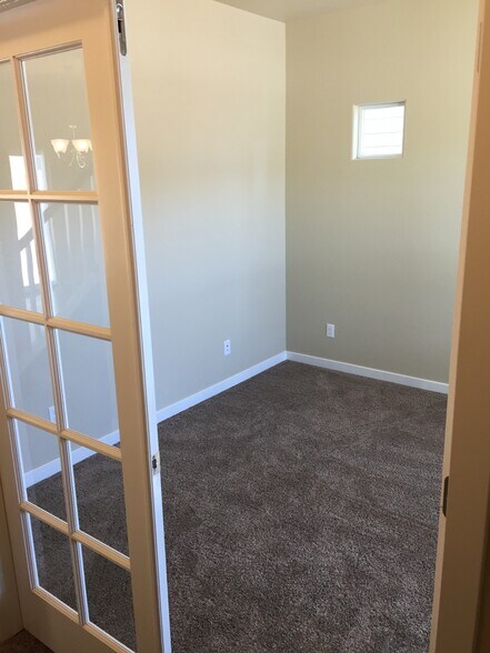 office/additional living space with french doors - 7766 Wagonwood Place