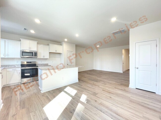 Building Photo - Modern Comfort Meets Peaceful Living—Stunning 3 Bedroom Townhome Near Downtown Raleigh Available ...