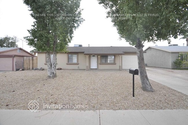 Building Photo - 3643 E Surrey Ave