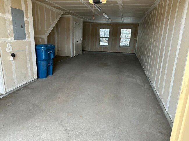 Building Photo - Large garage with attached spacious 2 bedroom townhome
