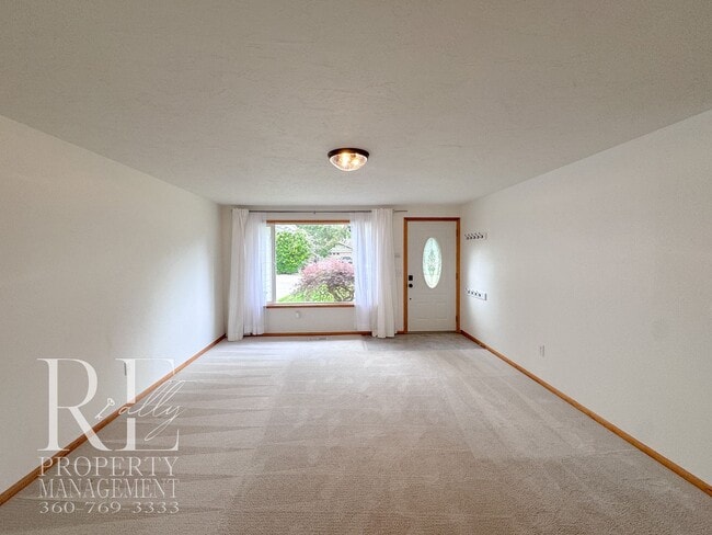 Building Photo - Bright & Spacious Single-Level Home with Dual Living Areas