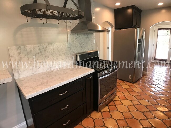 Building Photo - Beautifully remodeled Spanish style home with Granny Flat, Washer & Dryer, Large Backyard!