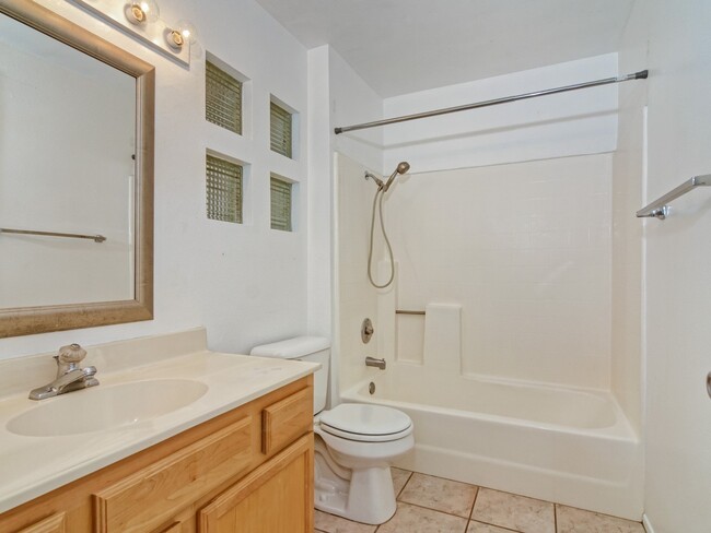 Building Photo - Sunny Top Floor Condo With Private Balcony...