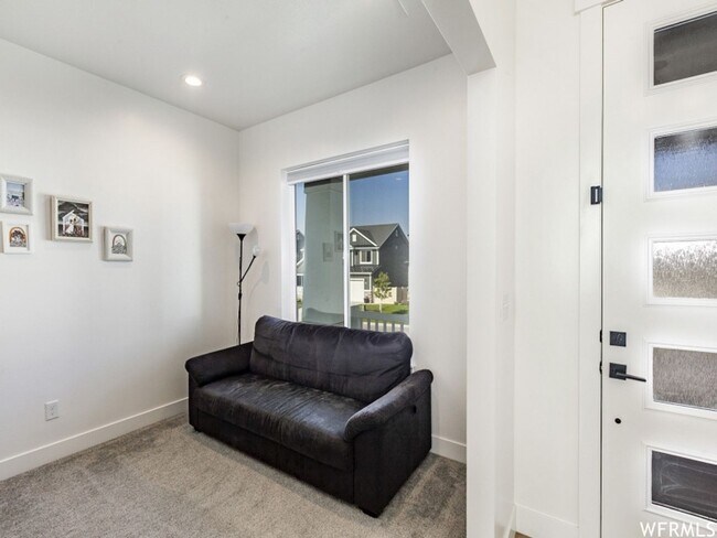 Building Photo - Spacious Open Floor Plan Available Soon!