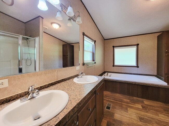 Building Photo - Cozy and Adorable home 4 bedroom 2 bath home on over 1 acre near McRae Lake! Relax on the covered...