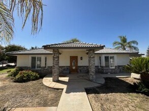 Building Photo - Spacious 4-Bedroom Home on 2.5 Acres with ...