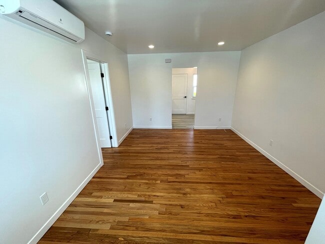 Building Photo - Beautiful, Tree-Lined Street in Residential Neighborhood. Remodeled, with AC, Personal Washer/Dryer