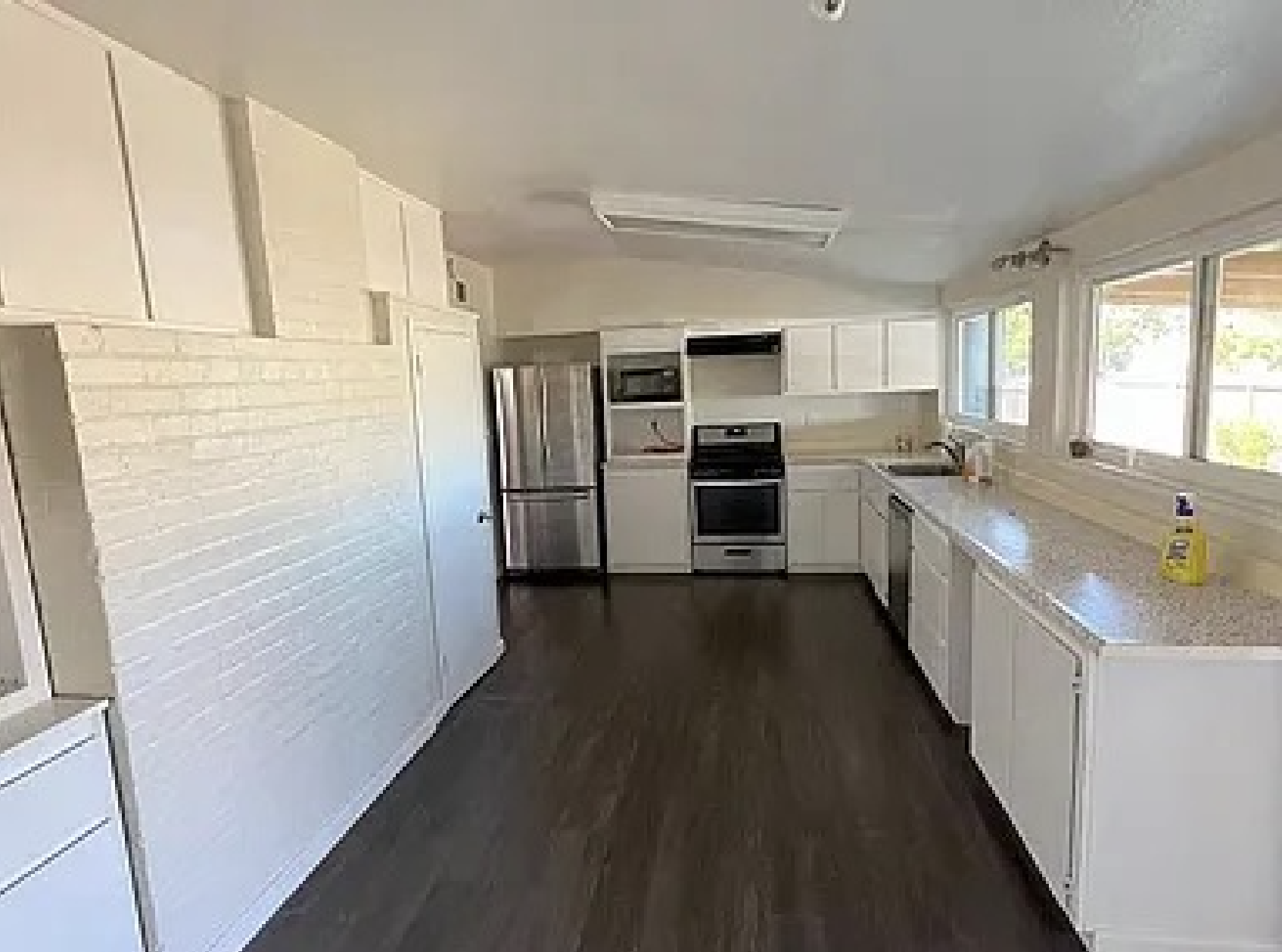 Large kitchen with stainless steel appliances - 27596 La Porte Ave