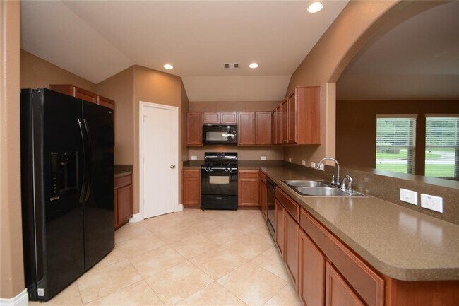 Building Photo - 12567 Canyon Falls Boulevard