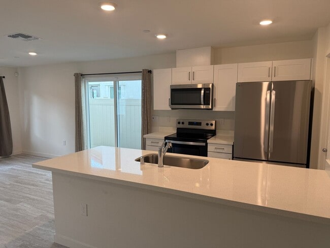 Building Photo - New Home in Gated Community