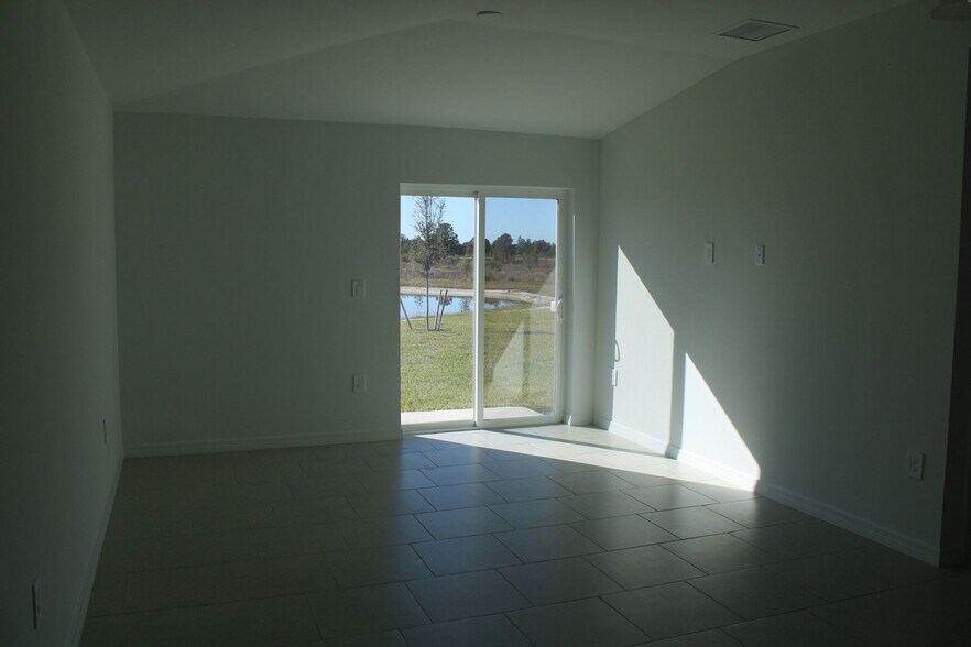 Building Photo - Brand New Construction in Lehigh Acres at Savanna Lakes MOVE IN SPECIAL FIRST MONTH RENT FREE!