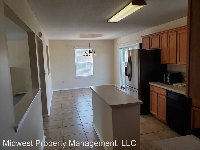 Building Photo - 4 br, 3 bath House - 6191 N Gregory Dr