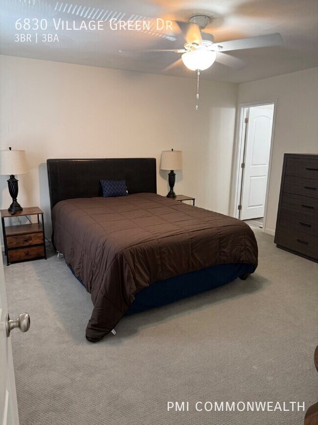 Building Photo - 6830 Village Green Dr