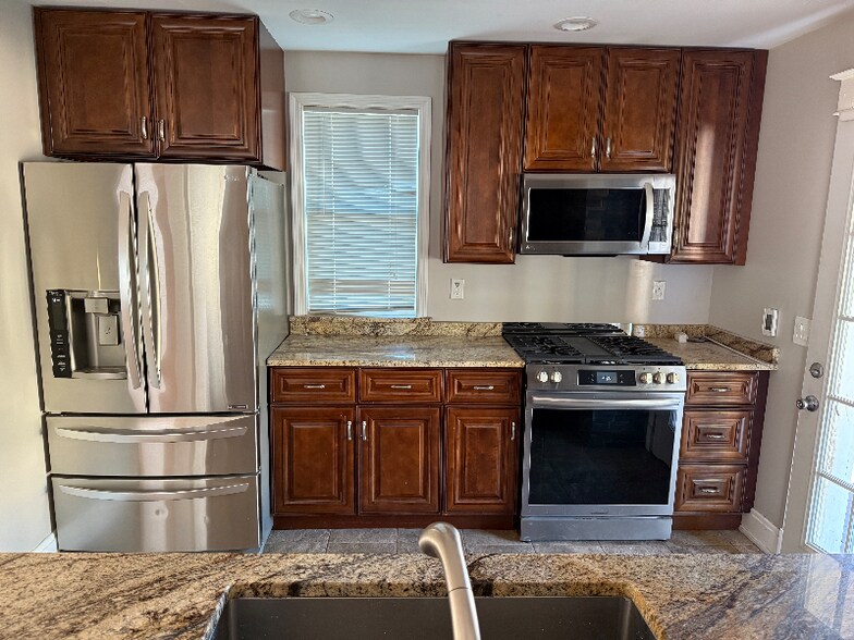 Building Photo - 4012 Gilmore Ave